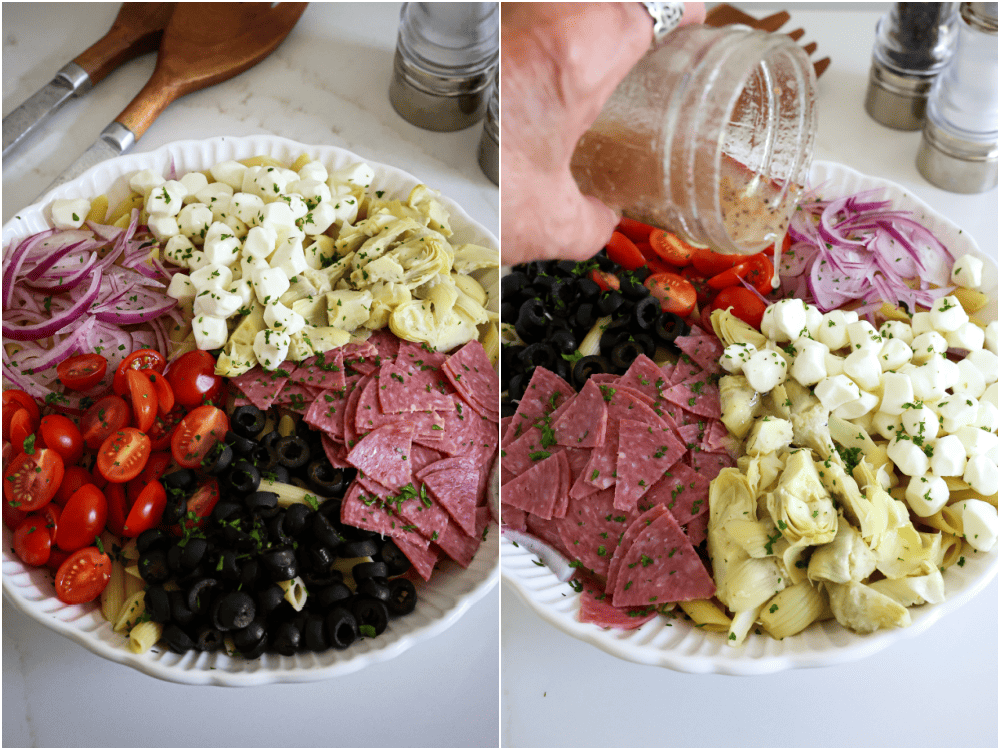 Italian Pasta Salad Recipe A serving bowl full of the ingrediets for Italian pasta salad. Homemade Italian dressing drizzled over the Italian pasta salad before being tossed.