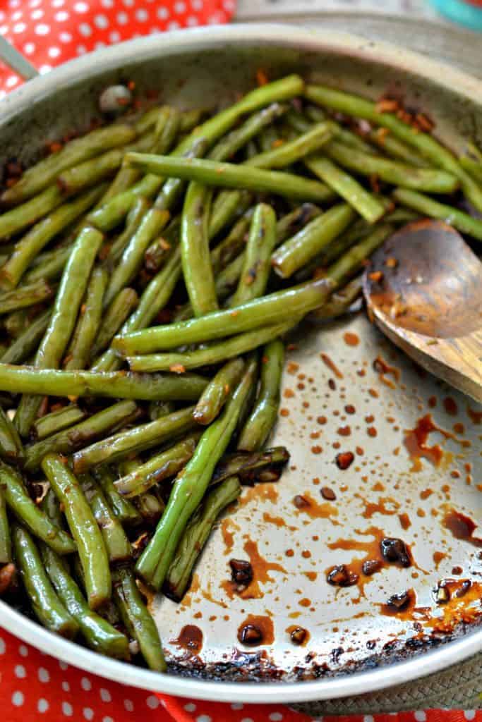 Sautéed in a sweet ginger and garlic sauce, these stir fry green beans are the perfect side dish