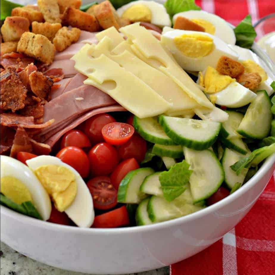 This beautiful Chef Salad brings all the best hearty protein together with fresh tomatoes, cucumbers and seasoned croutons. 