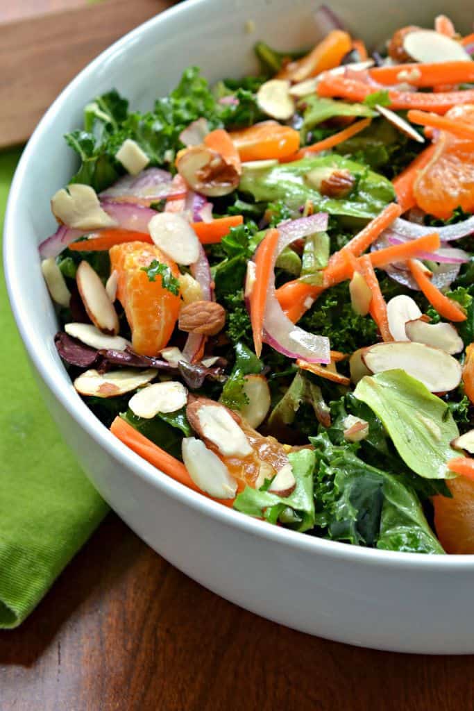 This fresh kale salad is topped with a ginger Vinaigrette for a zingy Asian flare