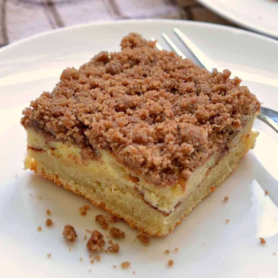 Butter cinnamon streusel crumble tops this moist cinnamon and cream cheese coffee cake