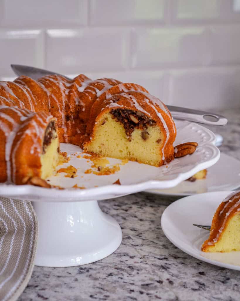 A cut Sock It to Me Cake on a cake platter.