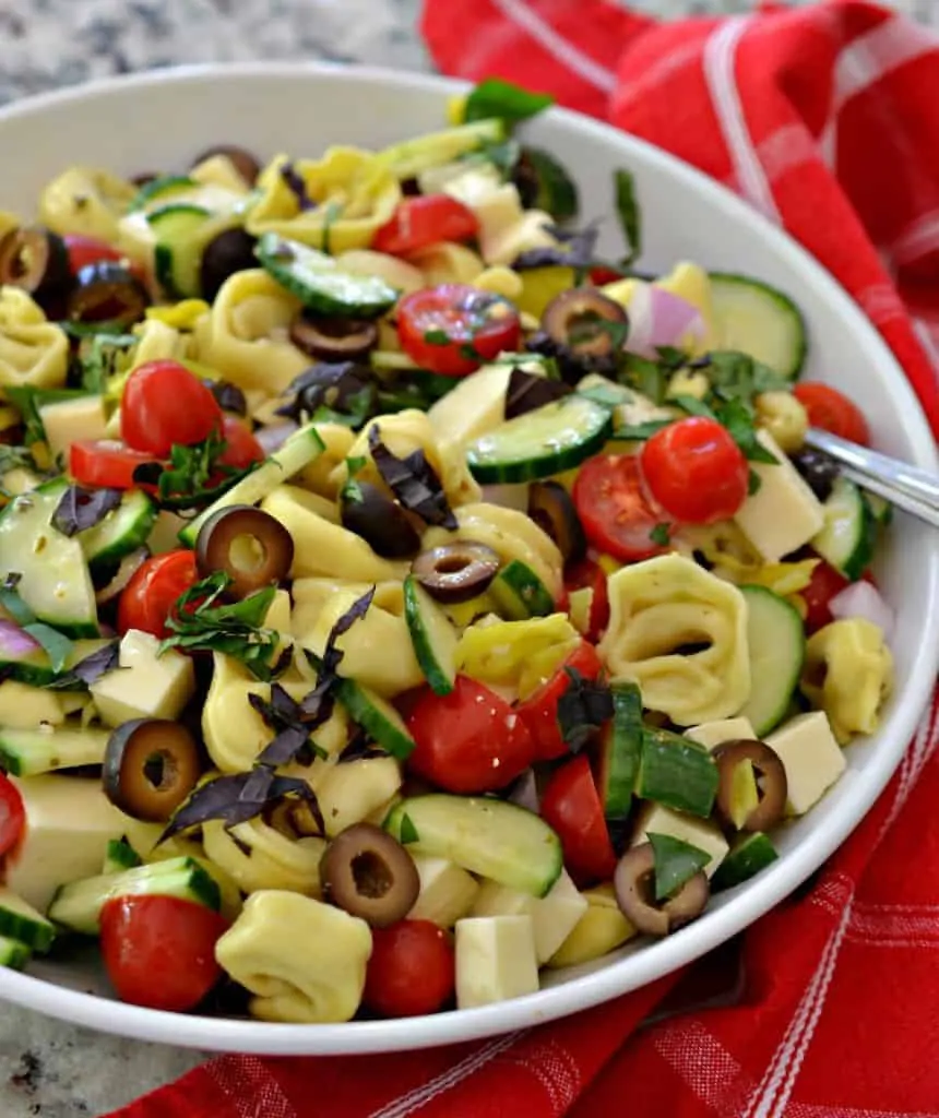A delicious and easy pasta salad filled with fresh colorful vegetables. 