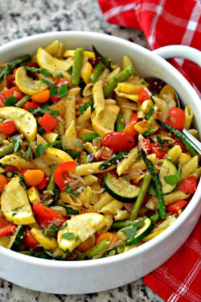 Pasta Primavera is a delicious pasta dish with flavorful vegetables and tender penne pasta.