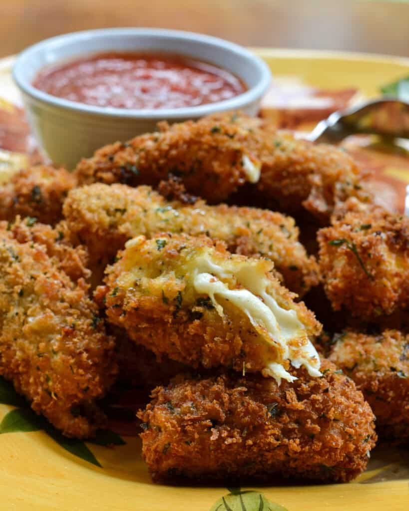 Close up of an open mozzarella stick.