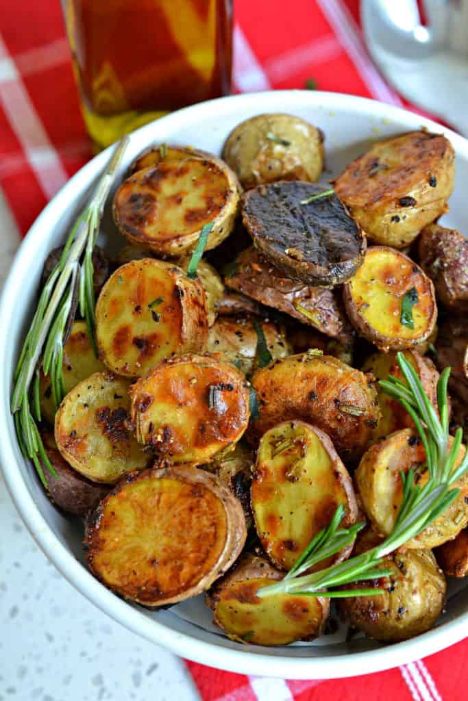 Simple yet elegant, these delectable Rosemary Roasted Potatoes make the perfect side for chicken, ham, turkey, and roast beef. 