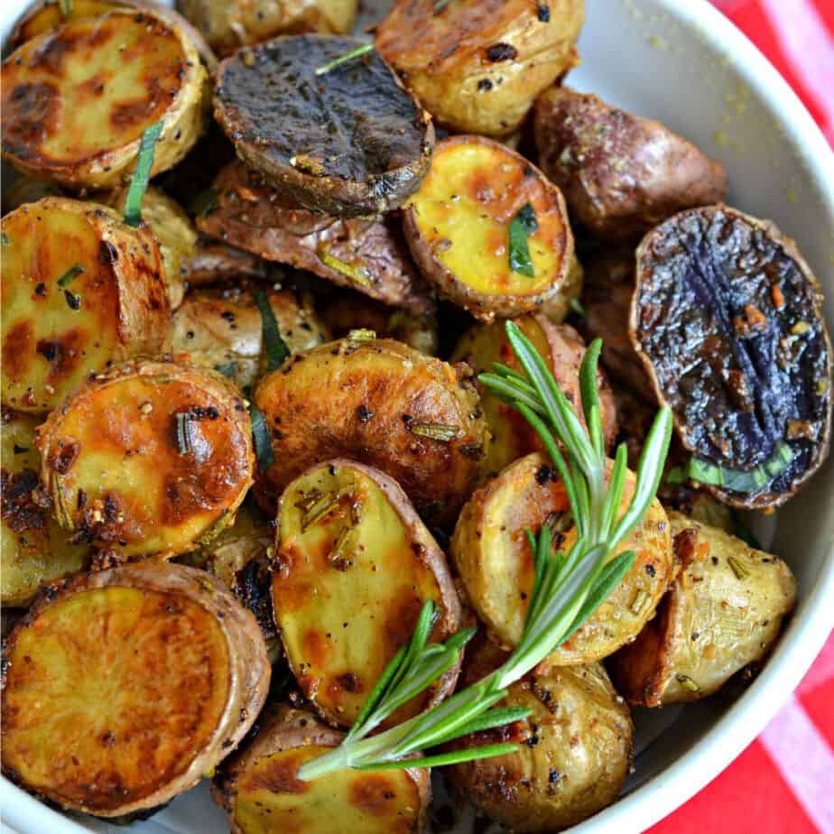 New or baby potatoes tossed with olive oil, Parmesan and fresh rosemary then roasted to golden perfection.