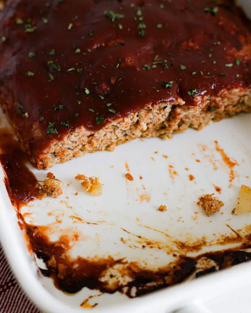 Turkey Meatloaf Recipe Glazed turkey meatloaf in a white baking dish.