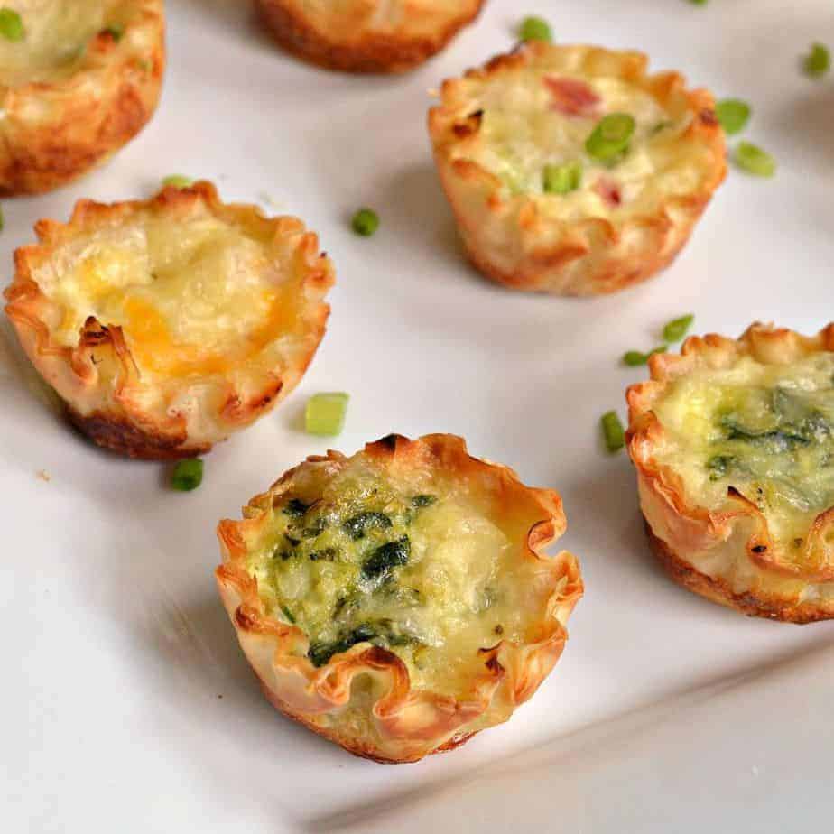 Delicious mini quiche made in flaky phyllo dough with egg, spinach, bacon, and cheese