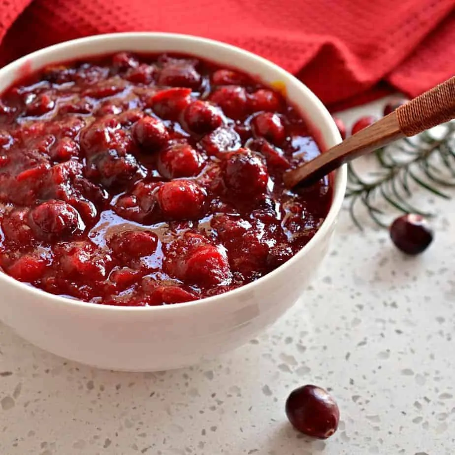 This six-ingredient Cranberry Sauce recipe is an easy side dish and worlds better than the canned version that our grandparents served with Thanksgiving dinner.