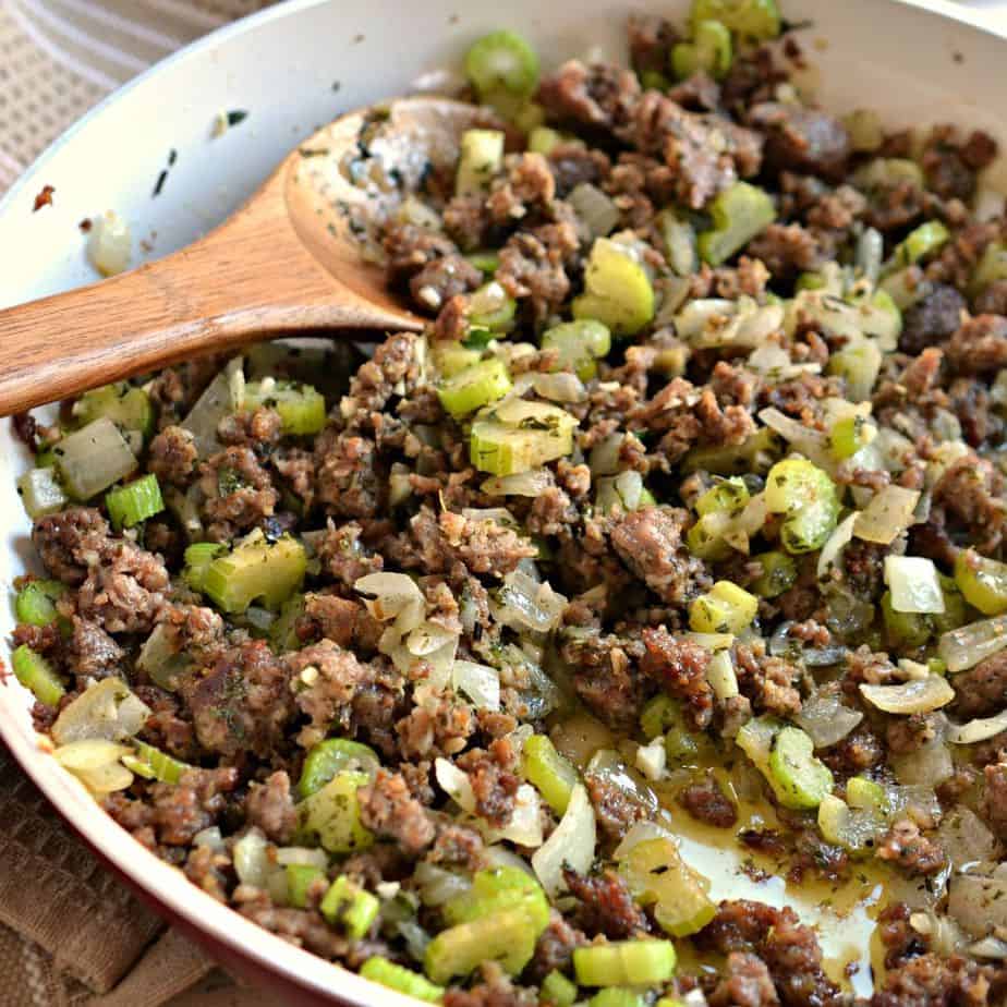 Reduce the heat and stir in the garlic, parsley, rosemary, sage, and thyme.  Cook for about 30 seconds, stirring constantly.