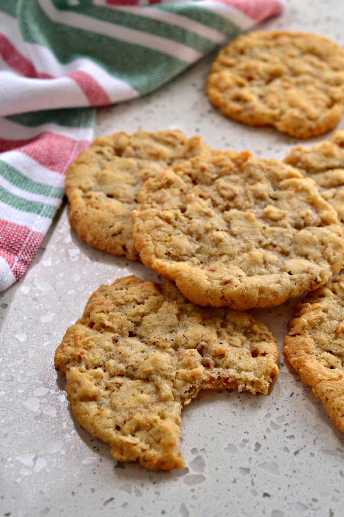 These delectable Anzac Biscuits are oatmeal coconut cookies with crispy edges and chewy centers.