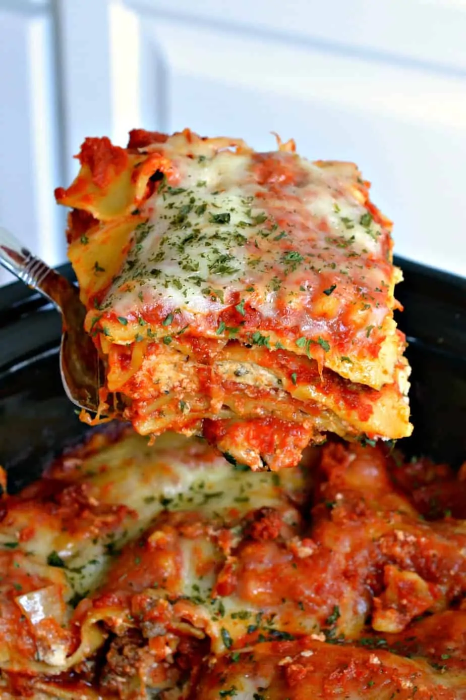 Crock Pot Lasagna is an easy family-friendly recipe cooked right in your slow cooker