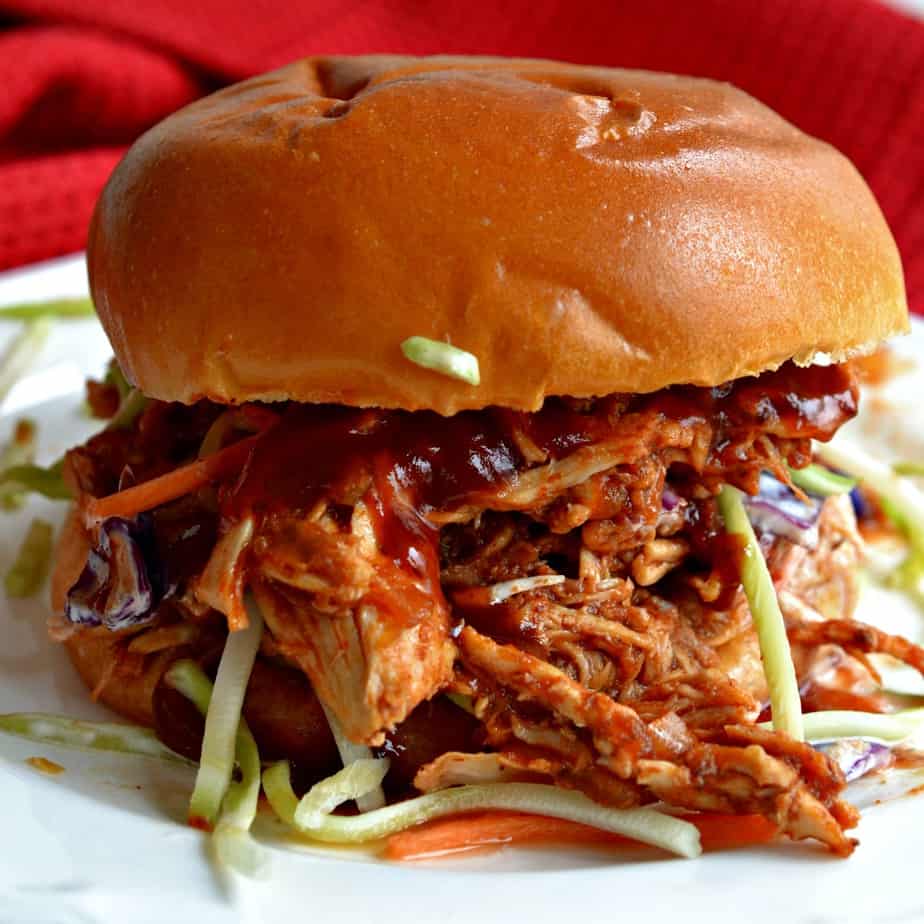 This easy crockpot-pulled chicken is shredded chicken with bbq sauce cooked up tender and juicy in the crockpot.