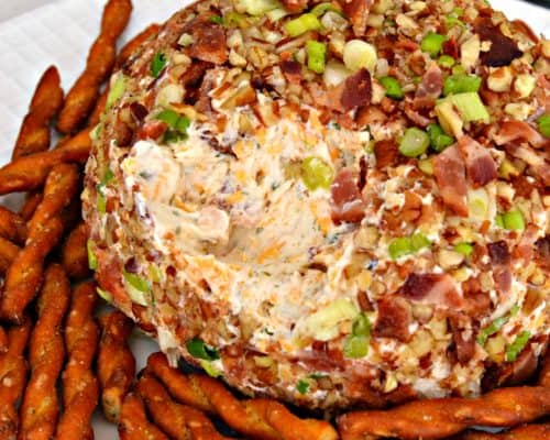 This Creamy Bacon Ranch Cheese Ball is easy to make and bursting with flavor.