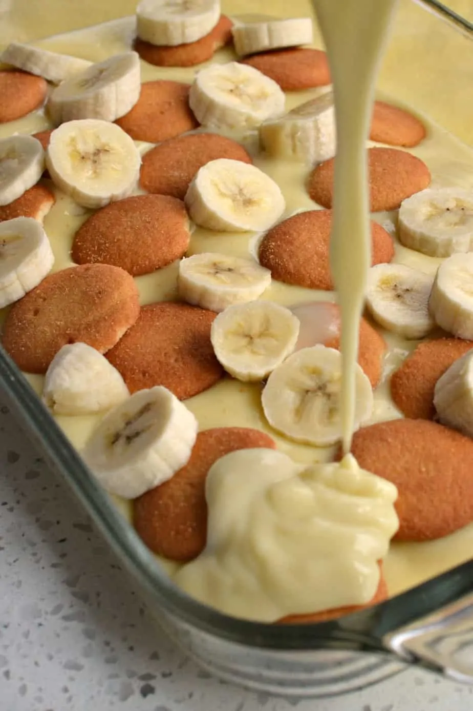 This homemade banana pudding combines sweet vanilla pudding, vanilla wafers, and bananas for a light, sweet dessert