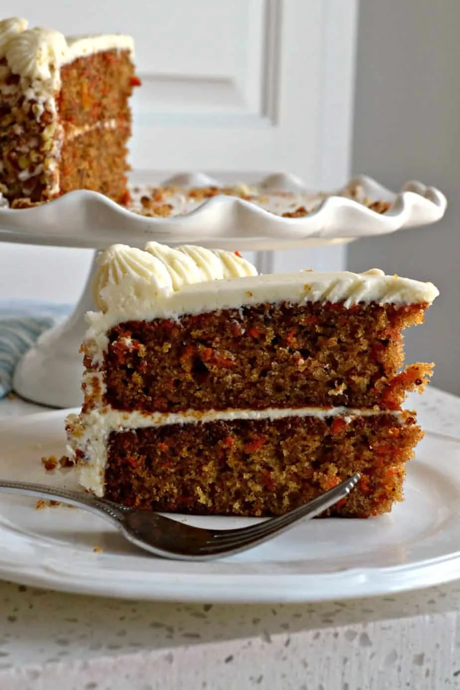 A delectable moist holiday carrot cake with a silky cream cheese frosting. 