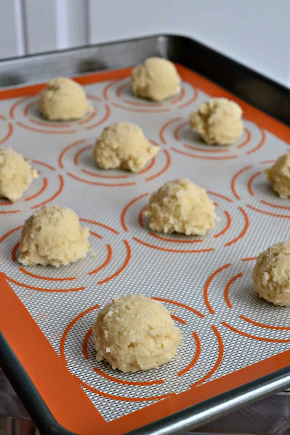These delectable soft lemon cookies are perfect for spring with a super easy four ingredient tangy lemon icing.