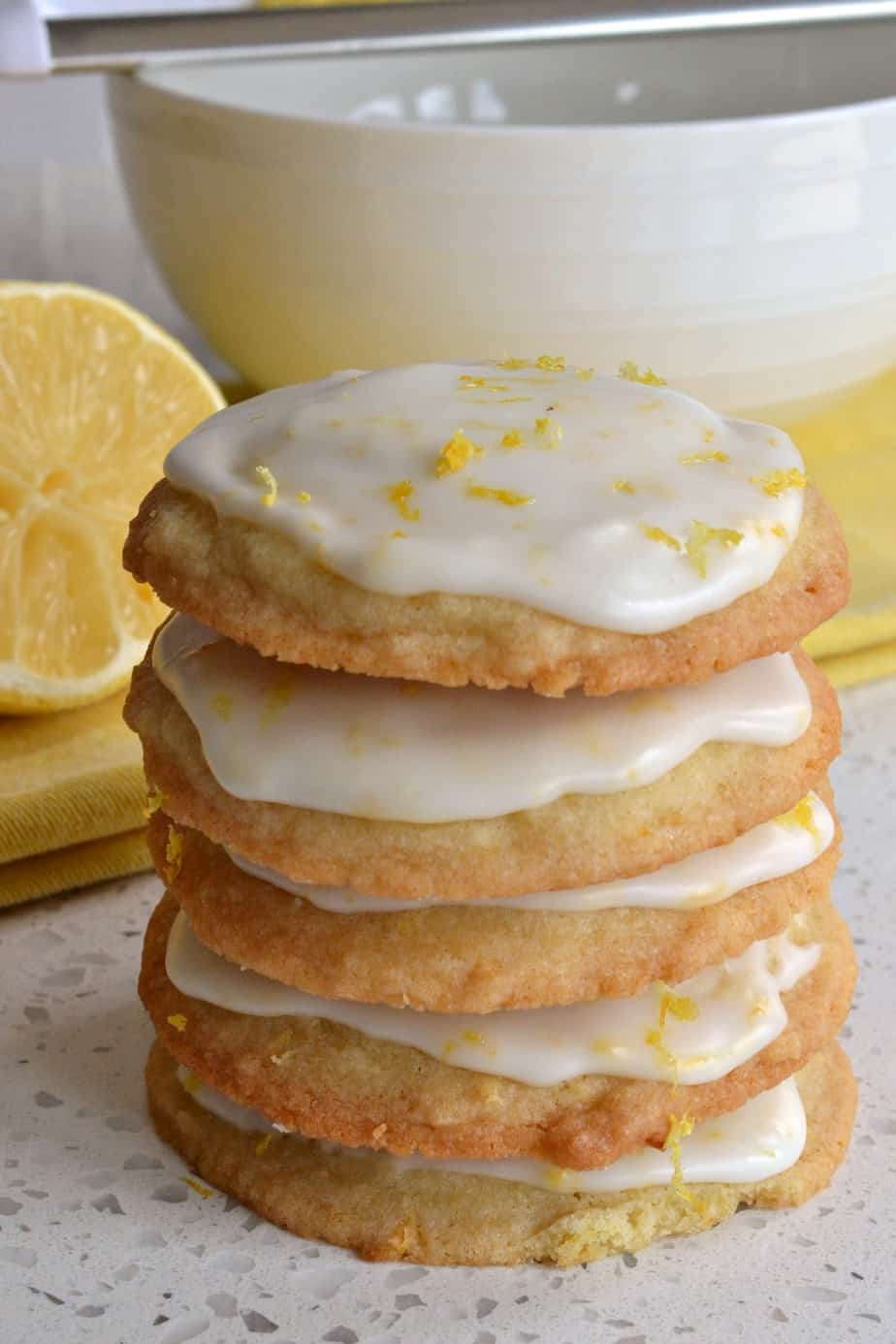 Iced Lemon Cookies are soft on the inside with slightly crispy edges all topped with a four ingredient sweet lemon glaze.