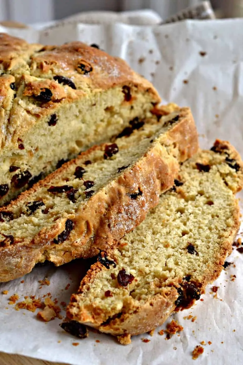 This fun easy Irish Soda Bread is prepped in under ten minutes.  It has a crispy crust with a soft sweet cake like center. 