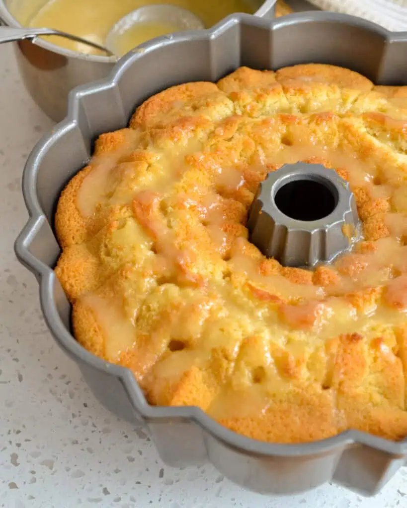 Poke holes in the cake using the small end of a chopstick. Pour the butter sauce into the holes slowly and carefully. 