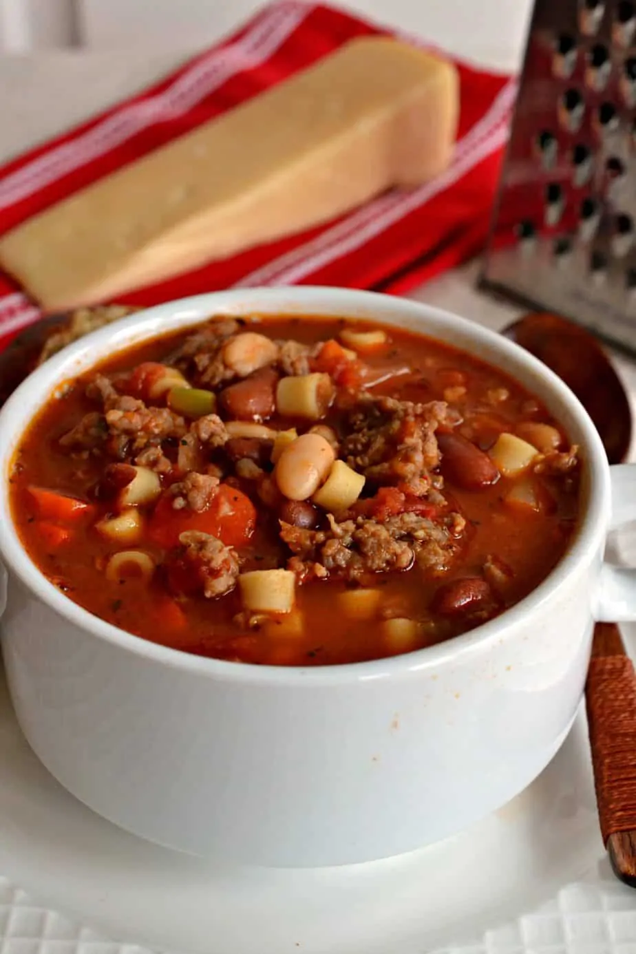 This Olive Garden copycat classic is bursting with flavor from Italian sausage, beans, pasta, Italian herbs and spices.