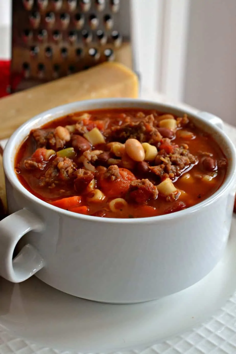 Pasta e Fagioli is a delectable Italian soup that combines Italian sausage, vegetables and beans in a rich tomato base.