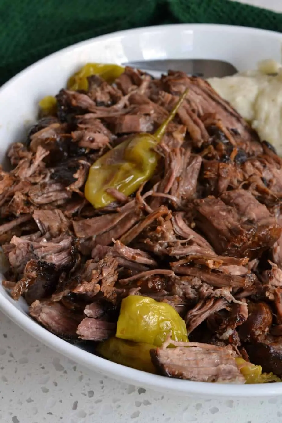 This family-friendly six ingredient ten-minute pot roast recipe is bursting with flavor from ranch seasoning mix. It is easily made in a crockpot or Dutch Oven. 