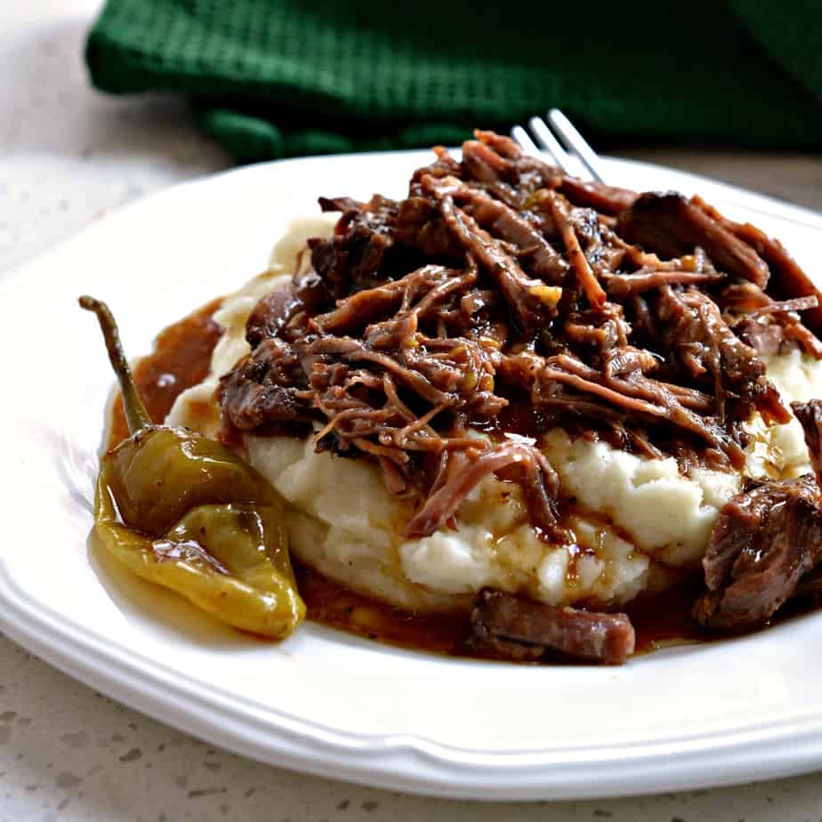 This mouthwatering good Slow Cooker Mississippi Pot Roast is made with five simple ingredients and less than ten minutes of prep time.