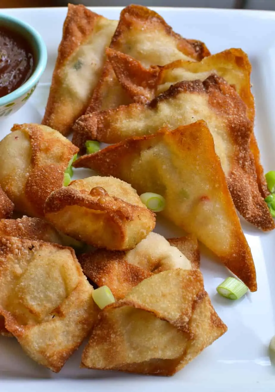 These Crab Rangoon are delectable crispy fried wontons stuffed with cream cheese and crab meat. 
