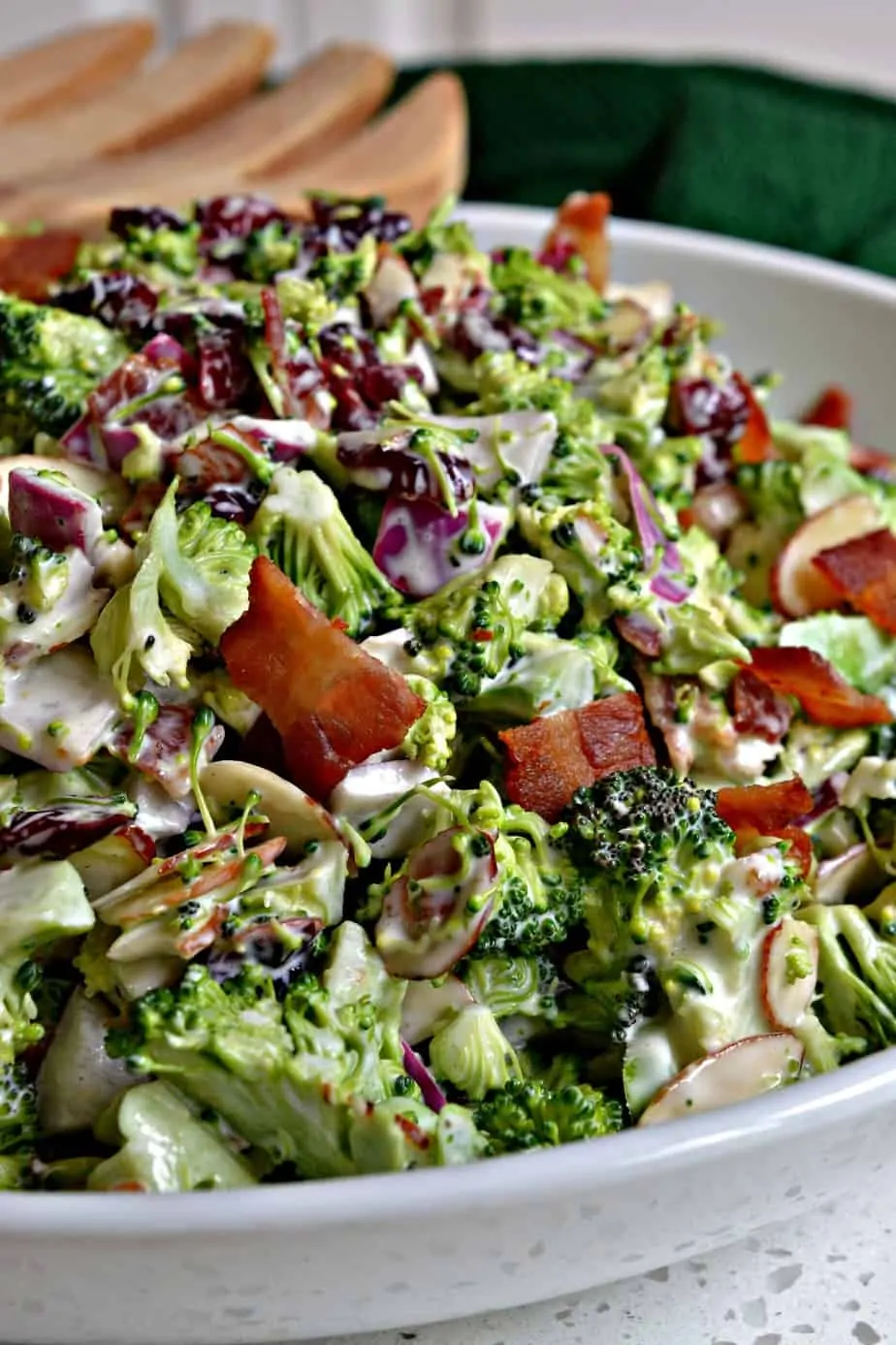 Broccoli salad is a refreshing, crisp summer salad topped with bacon and a creamy dressing