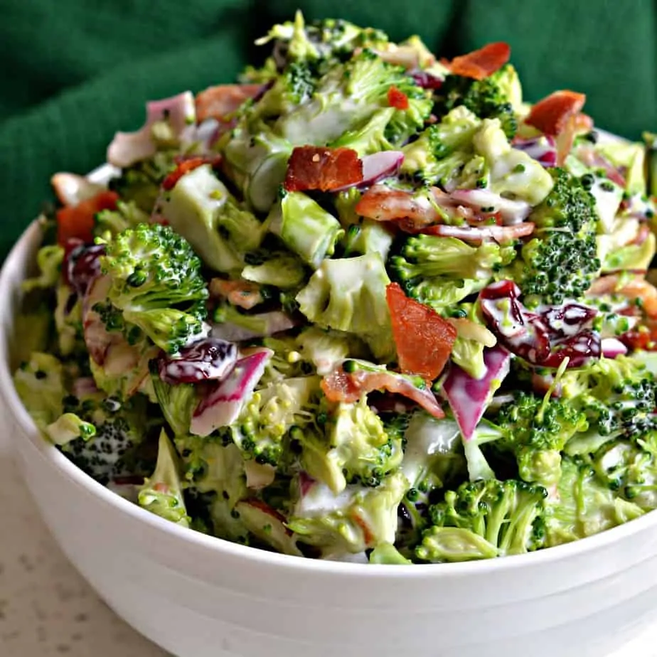 Broccoli Salad is one of my favorite go to summer recipes with fresh broccoli, smoked bacon, onion and sliced almonds. 