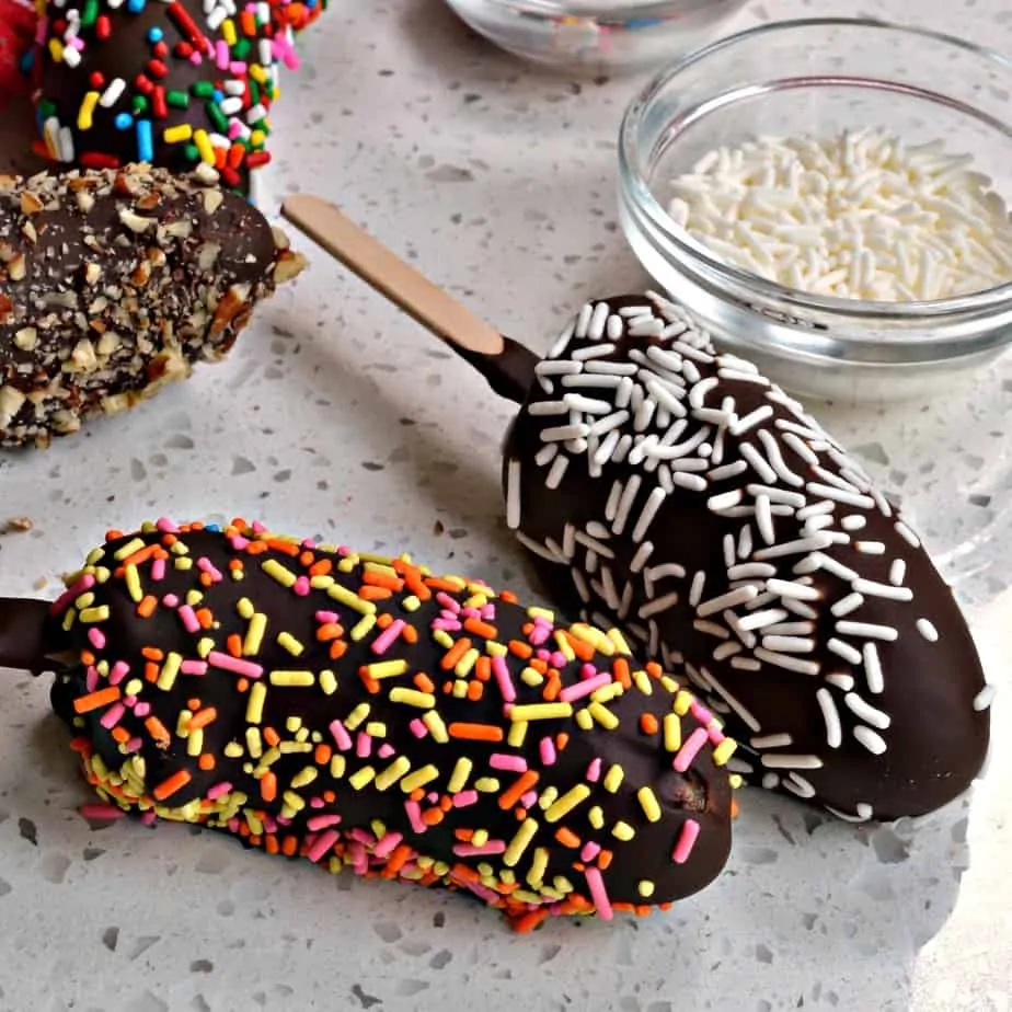 These Chocolate Dipped Frozen Bananas are a scrumptious cool summer treat for movie night, game night, a pool party. 