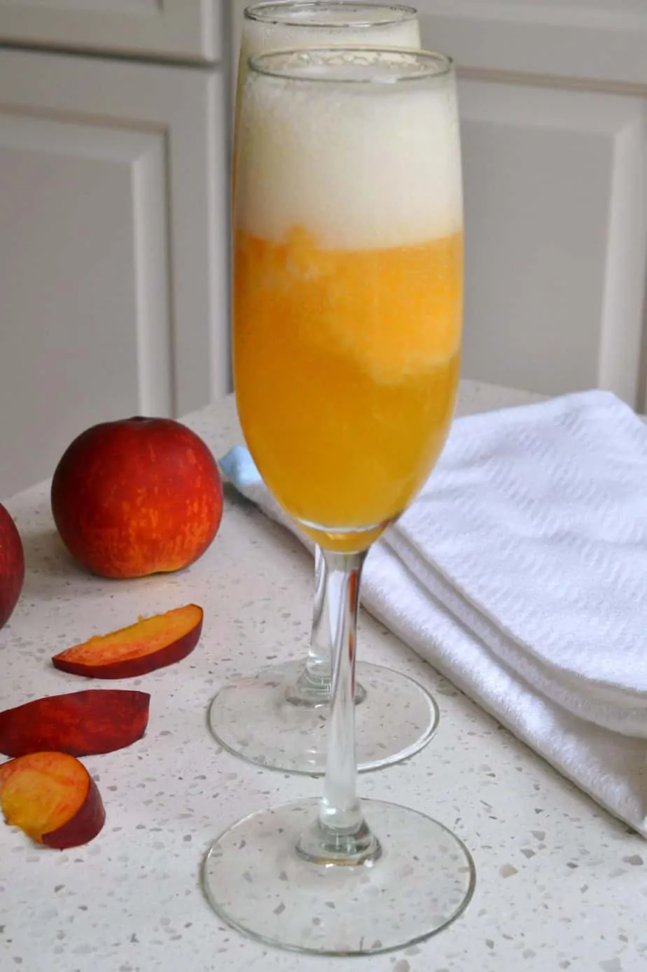 This delectable Peach Bellini is made with fresh or frozen peaches and is the ultimate party drink.