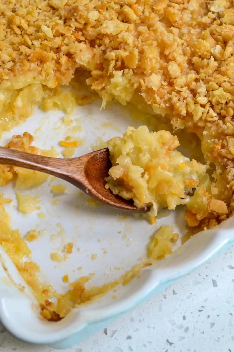 Pineapple casserole covered with buttery ritz cracker crumb topping