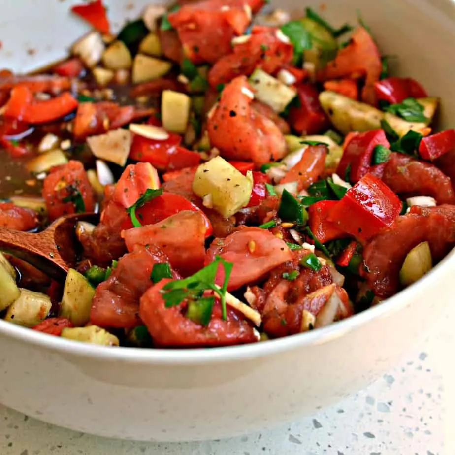 This Gazpacho Recipe is the perfect soup for one of those excruciatingly long hot July days. 