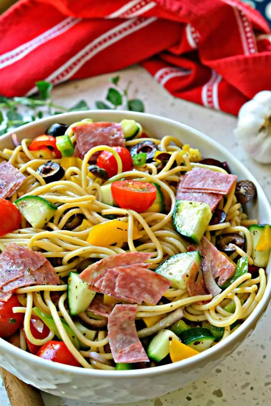 This Spaghetti Salad makes a delicious quick and easy light summer meal or side for all your grilling recipes.