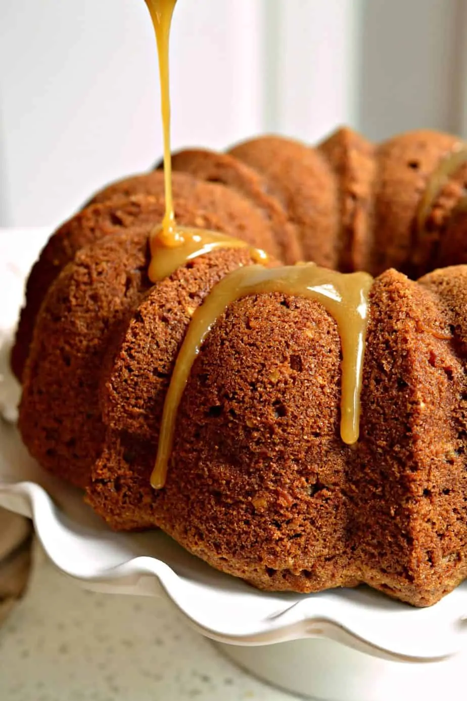 This Apple Cake is lightly drizzled with a four ingredient caramel sauce. 