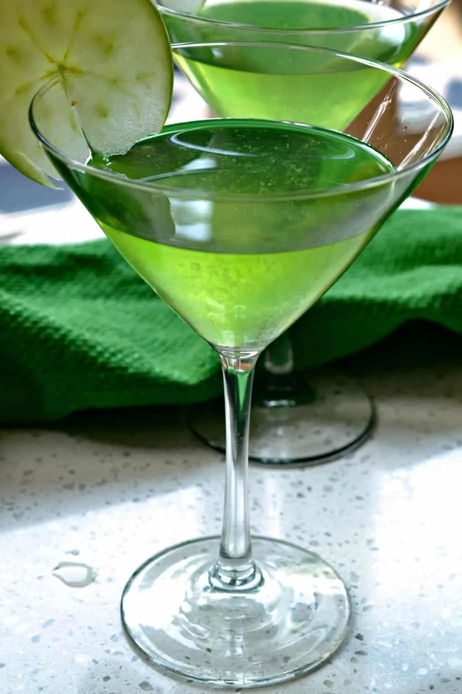 This party worthy Appletini is a four ingredient delicious sour apple cocktail that is made in less than two minutes.