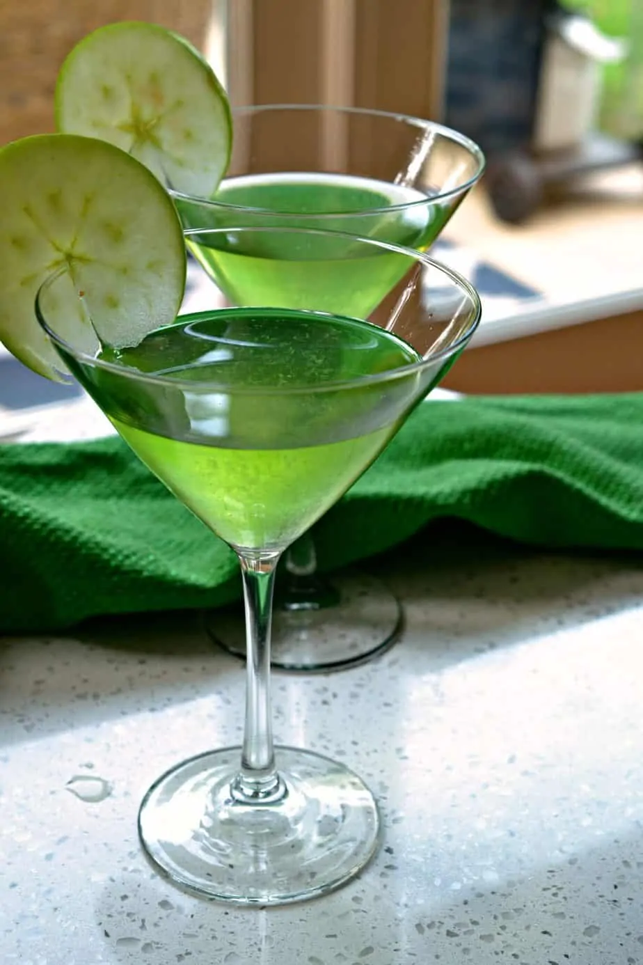  This four ingredient Appletini (Apple Martini) is one of our favorite party cocktails with its superb sour apple flavor.