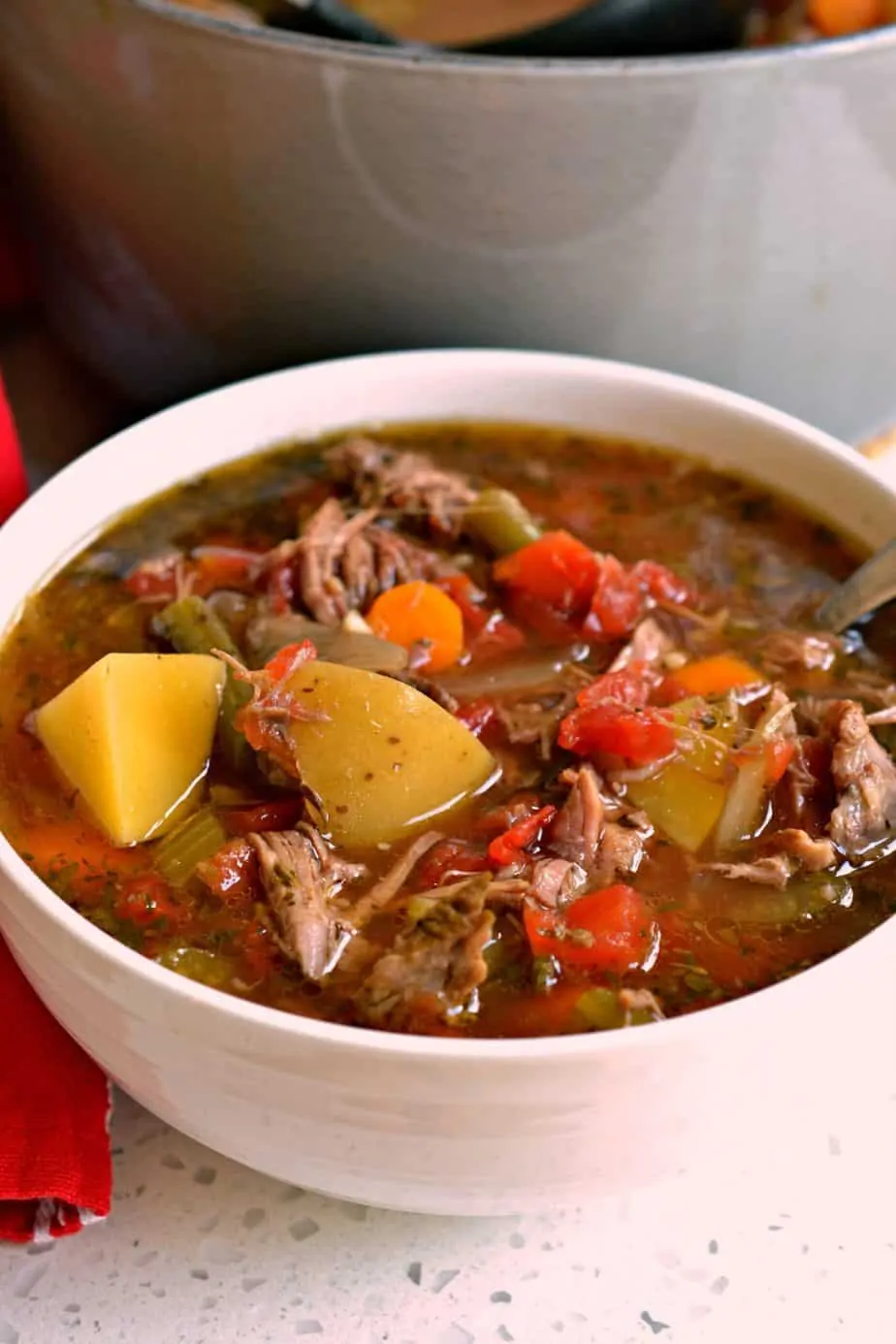 Beef Vegetable Soup is made with tender slow simmered chuck roast with celery, carrots, potatoes, tomatoes and green beans. 