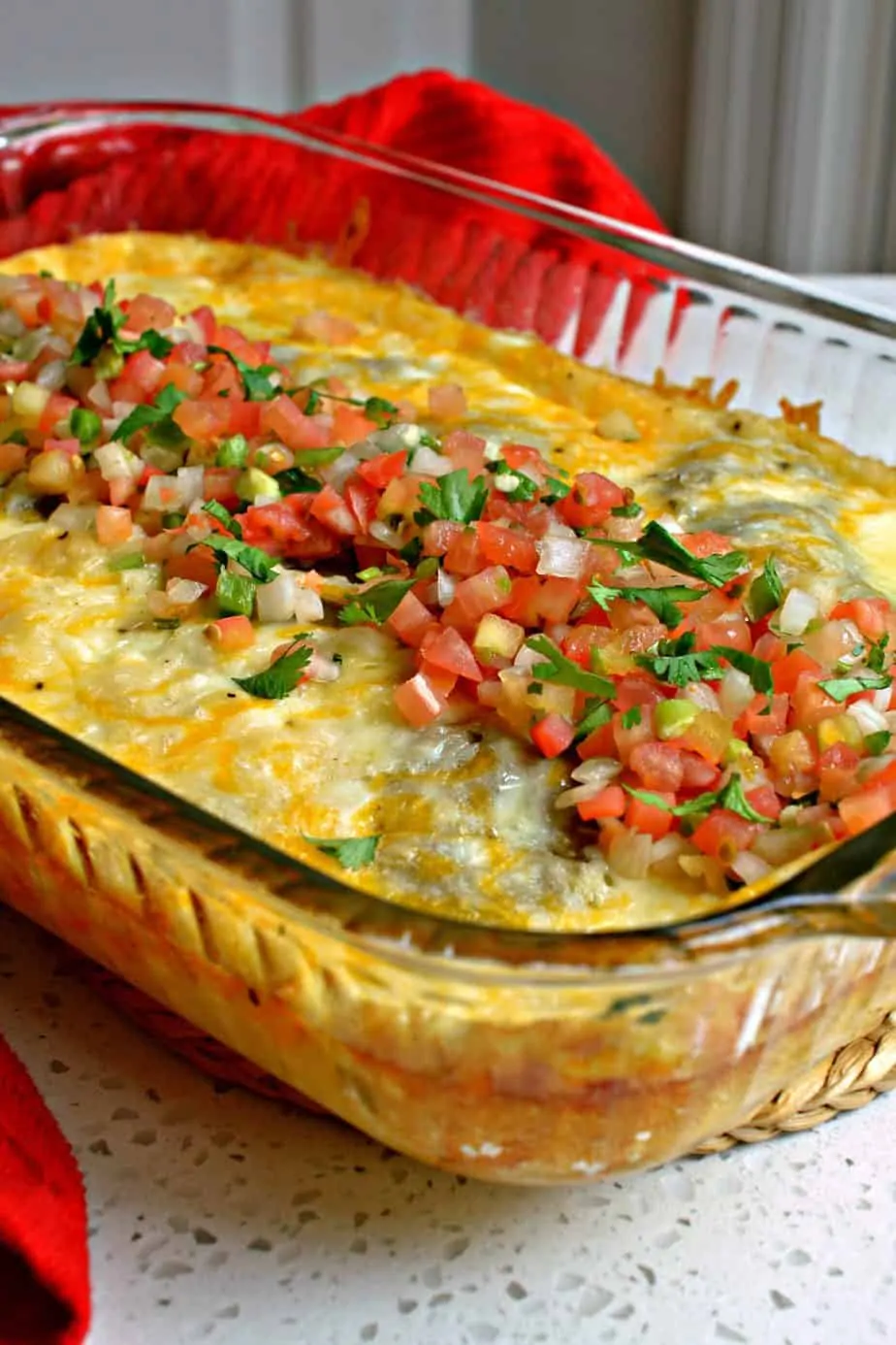 Egg and chile casserole with pico de gallo on top