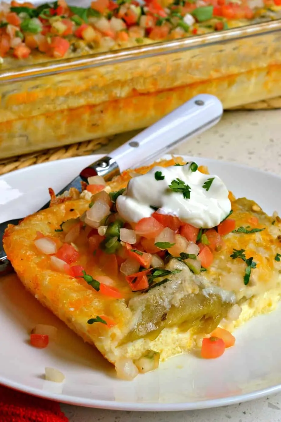 Egg and chile casserole piled high with pico de gallo and sour cream. 