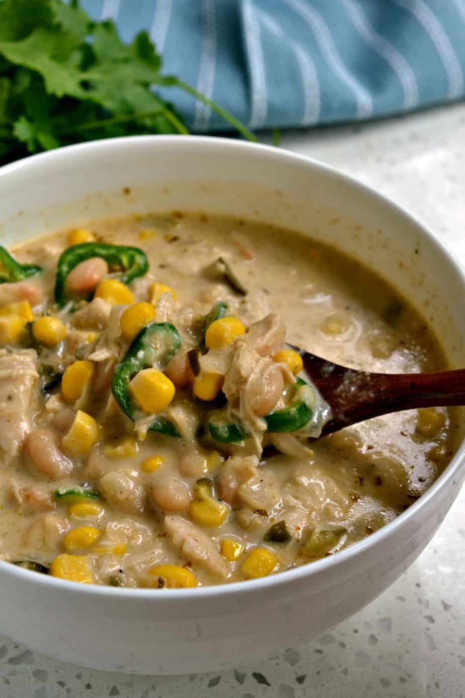 White Chicken Chili recipe is a creamy version of chili with white beans, chicken, cream, poblano and Anaheim peppers. 