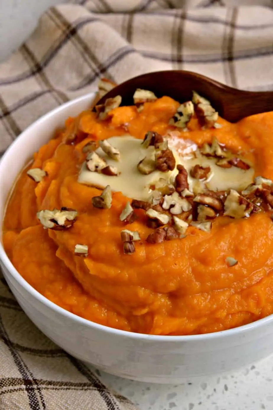 These delectable six ingredient Mashed Sweet Potatoes are so incredibly creamy with just a touch of sweetness.
