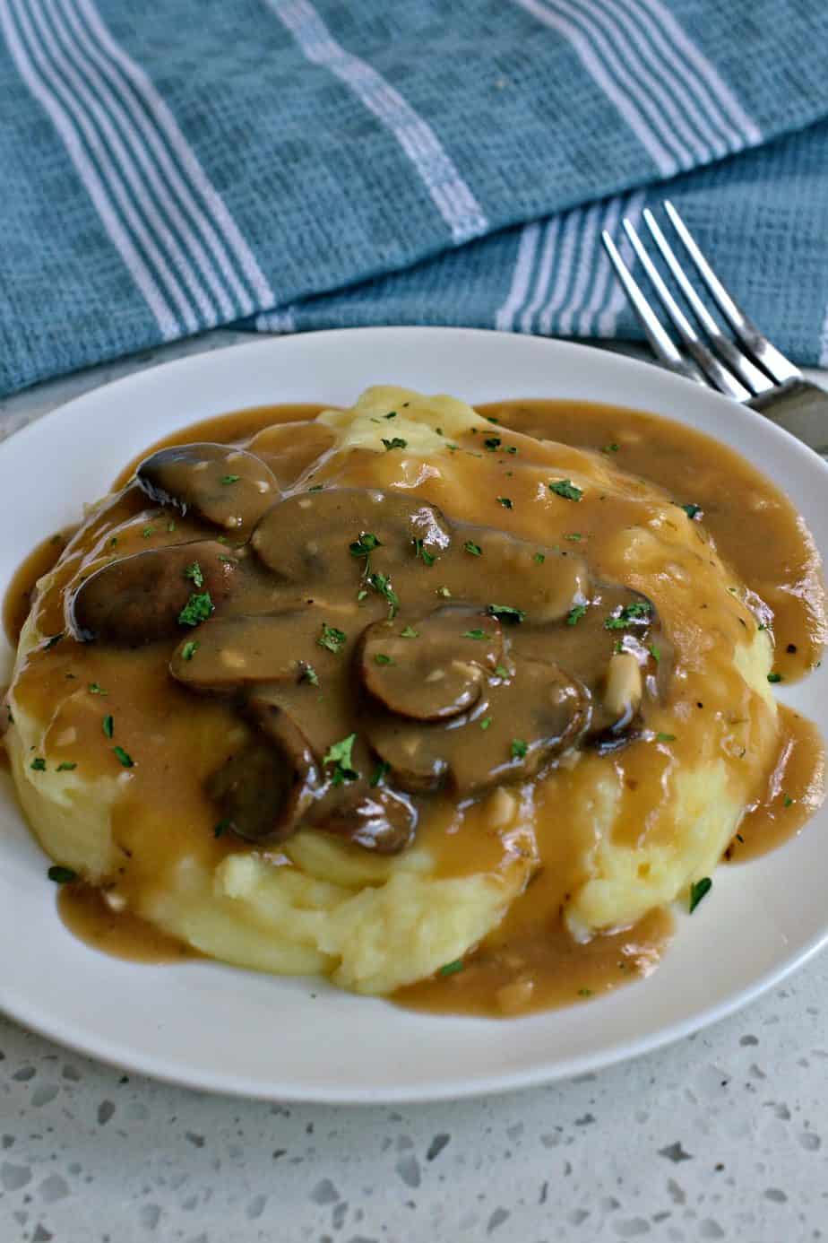 This super easy rich and flavorful Mushroom Gravy comes together with six ingredients in less than thirty minutes.
