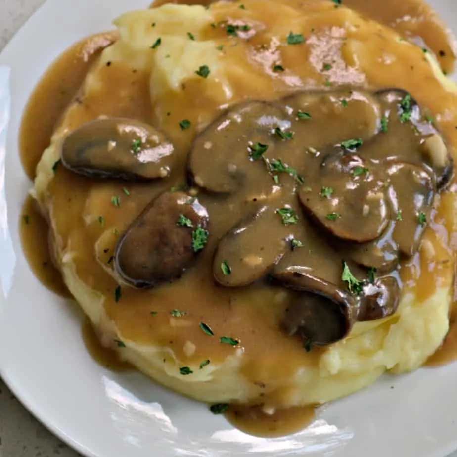 A quck and easy Mushroom Gravy that the whole family can enjoy with meatloat, steak, mashed potatoes, rice, or biscuits.