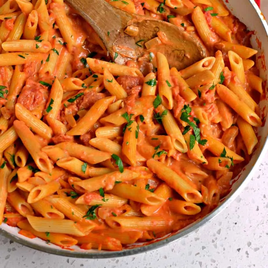 Penne alla Vodka is pasta in a rich creamy slightly tangy tomato sauce with garlic, onions, crushed tomatoes and vodka.