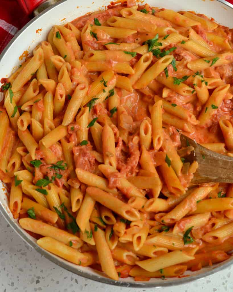 A big skillet full of penne alla vodka pasta. 