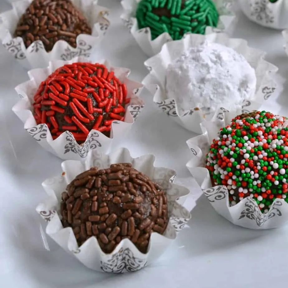 These fun and festive no bake chocolate Rum Balls are made easy with six ingredients in your food processor.
